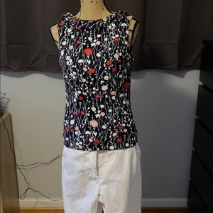 Beautiful navy multi colored top.